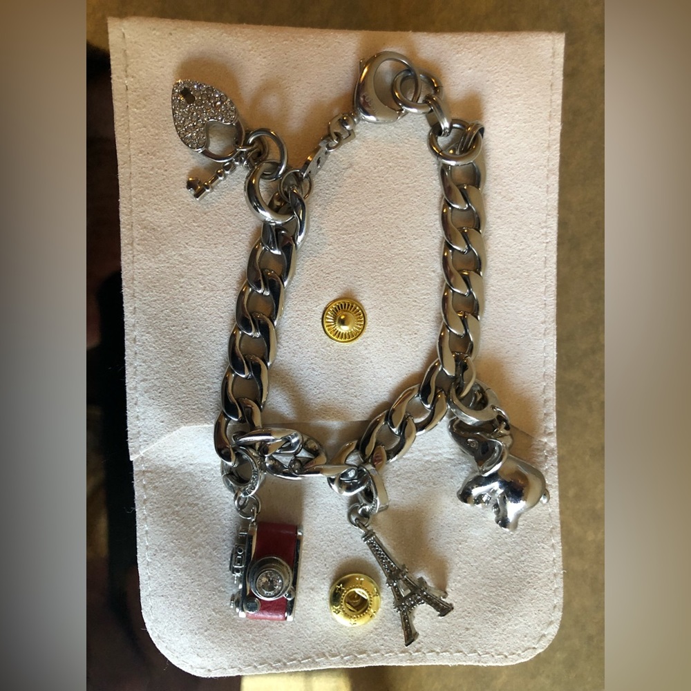 Fossil brand charm bracelet with 3 removable  charms